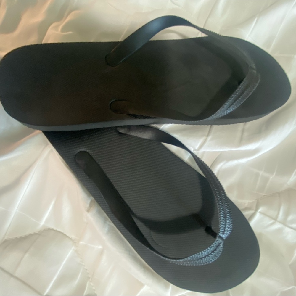 Black flip flops /worn once